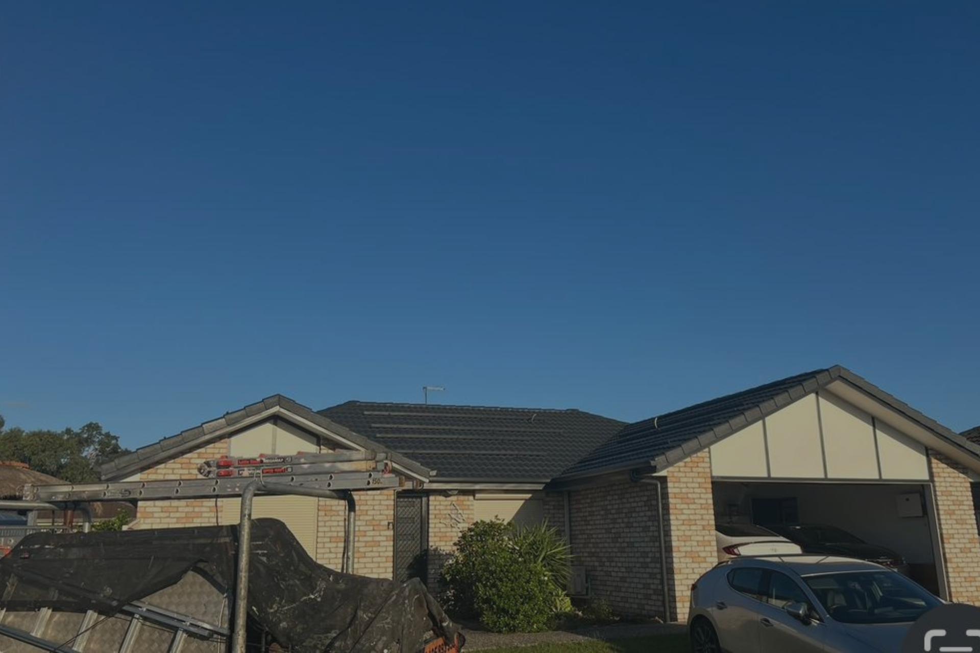 1 A house with a car parked in front, showcasing a suburban residential setting.